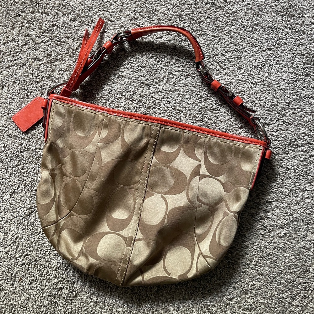 Classic coach pattern bag with coral trim, beautiful condition that used